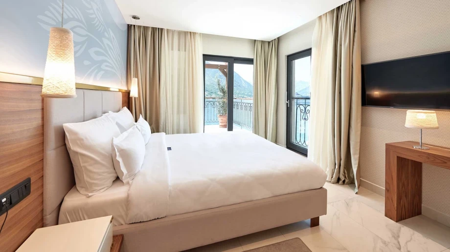 Elegant Penthouse Bedroom with Sea View in Dobrota