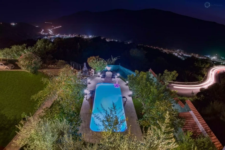 Nighttime Aerial View of Luxury Villa Serendipity