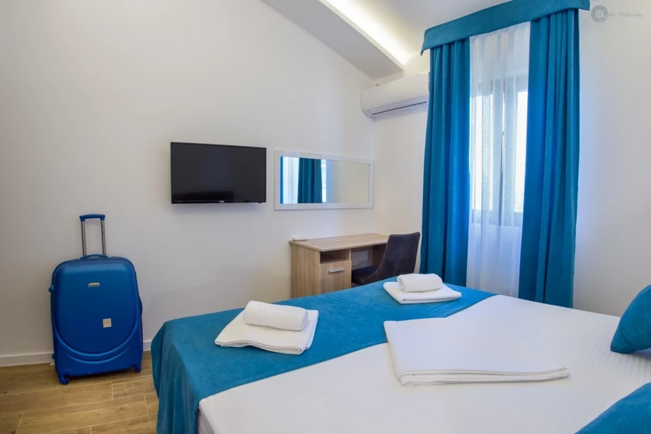 Bright Bedroom with Sea-Blue Decor