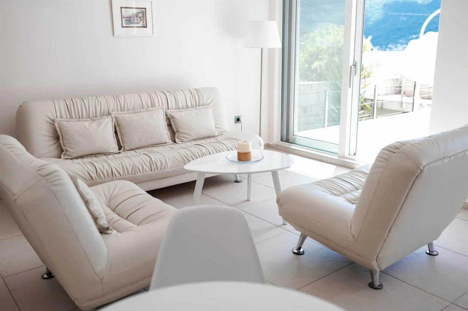 Bright modern living room inside a villa in Boka Bay