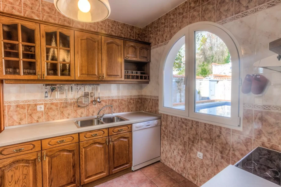 Rustic kitchen in Boka Bay villa with charming details