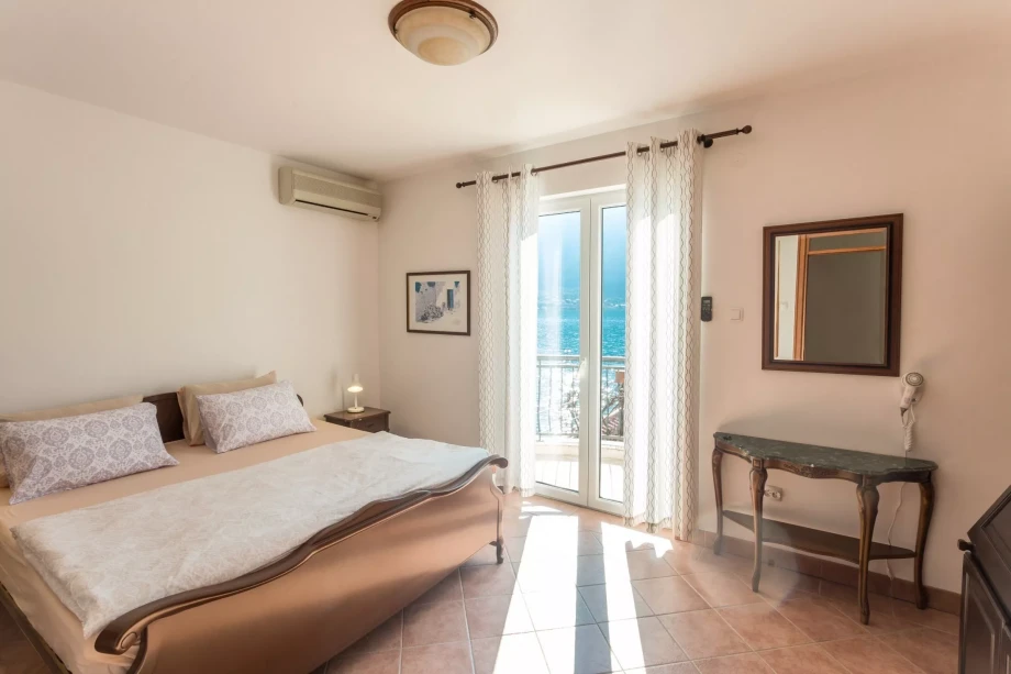 Comfortable bedroom in Boka Bay villa