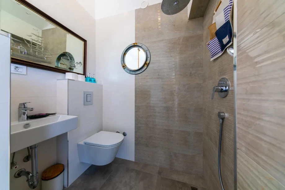 Private Bathroom with Elegant Brown Tiles