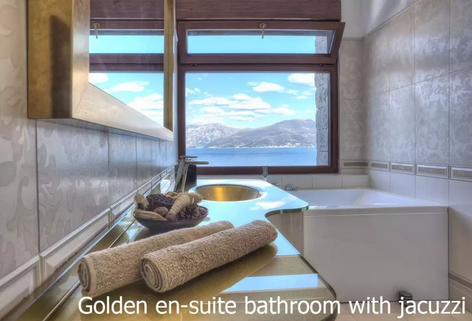 Beautifully decorated bathroom with a views