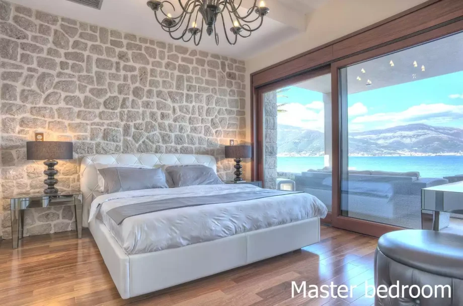 Luxurious Bedroom with Sea and Mountain View at Moonlight Beach Villa