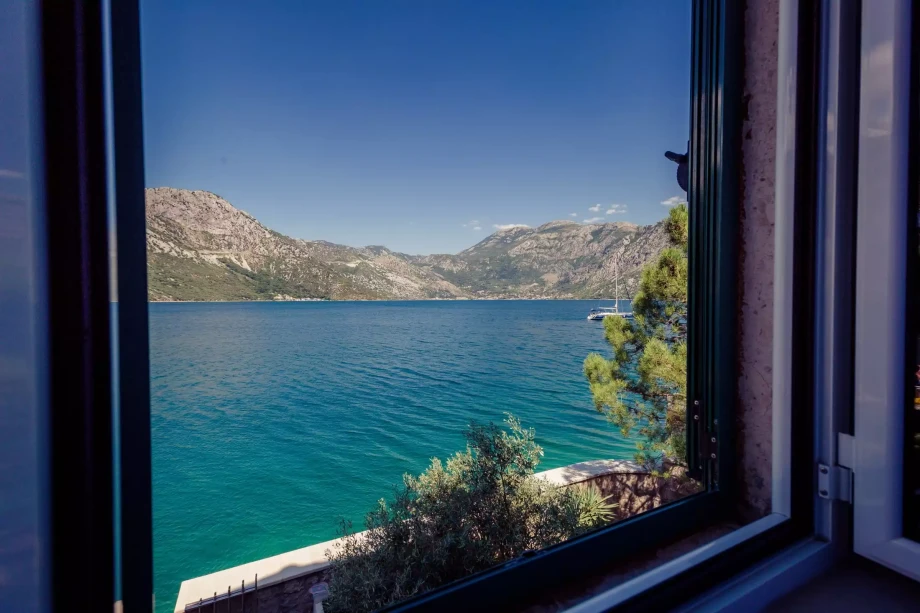 Beautiful seaview from a window inside Villa Pallazzo Trina in Kotor Bay