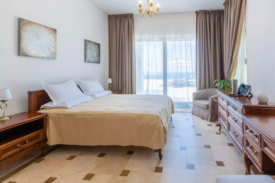 Bedroom with king size bed in Montenegro luxury villa Reef Tree with pool