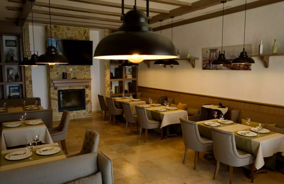 Restaurant with a fireplace, Villa complex Reef in Montenegro