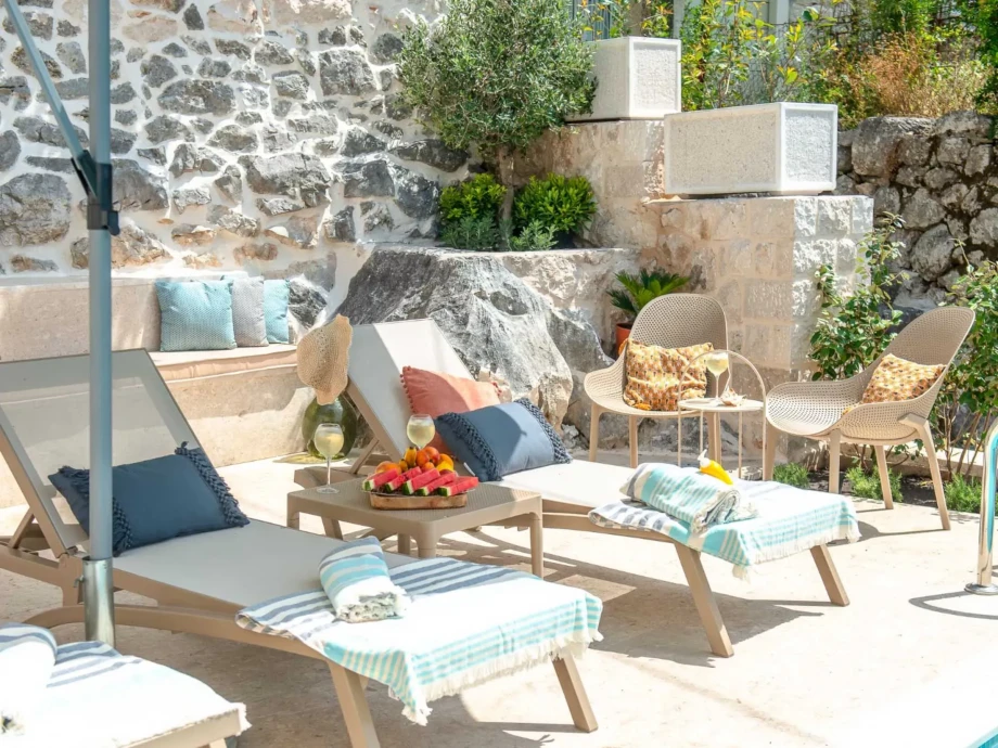 Outdoor area with sun loungers