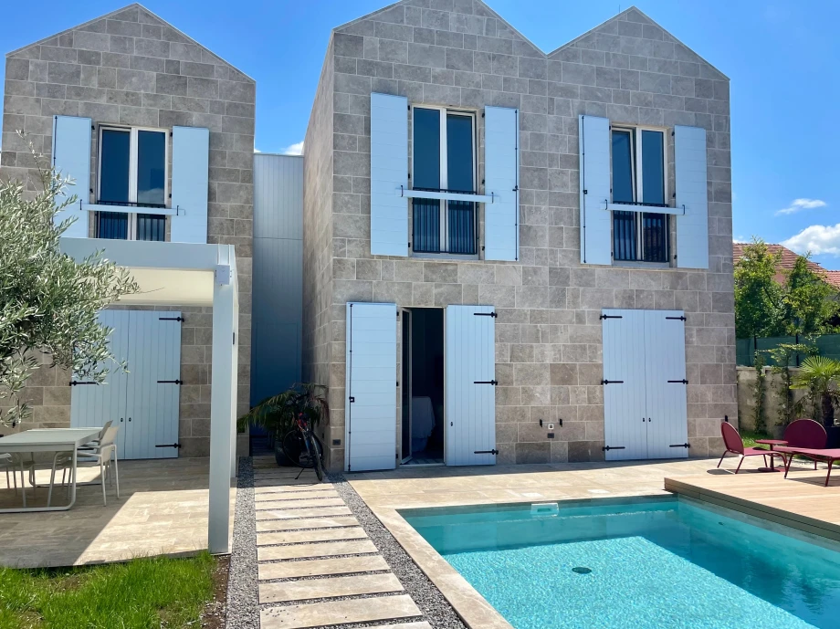 Stone Villa with Large Windows and Scenic Views