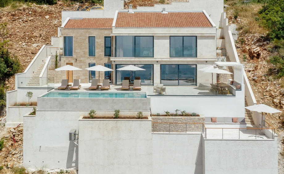 Exterior of the luxury villa with modern architecture and scenic surroundings