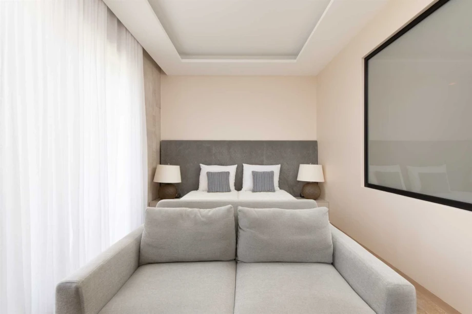 Elegant Bedroom with King-Size Bed and Scenic Views