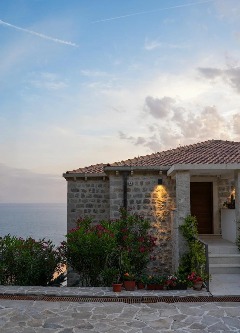 Elegant Exterior of the Villa Surrounded by Lush Landscaping