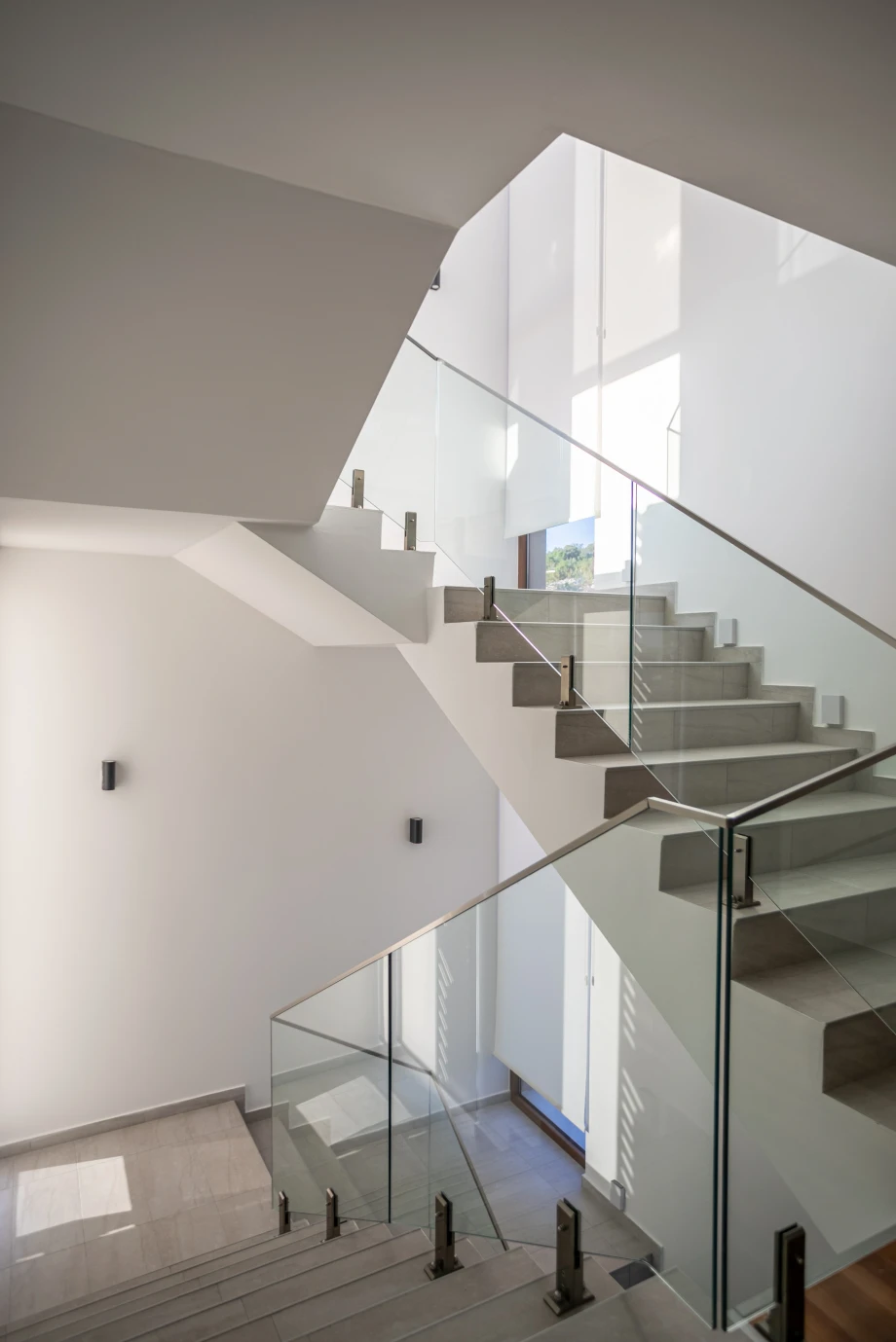 Elegant Internal Stairs Leading to Upper Levels of the Villa