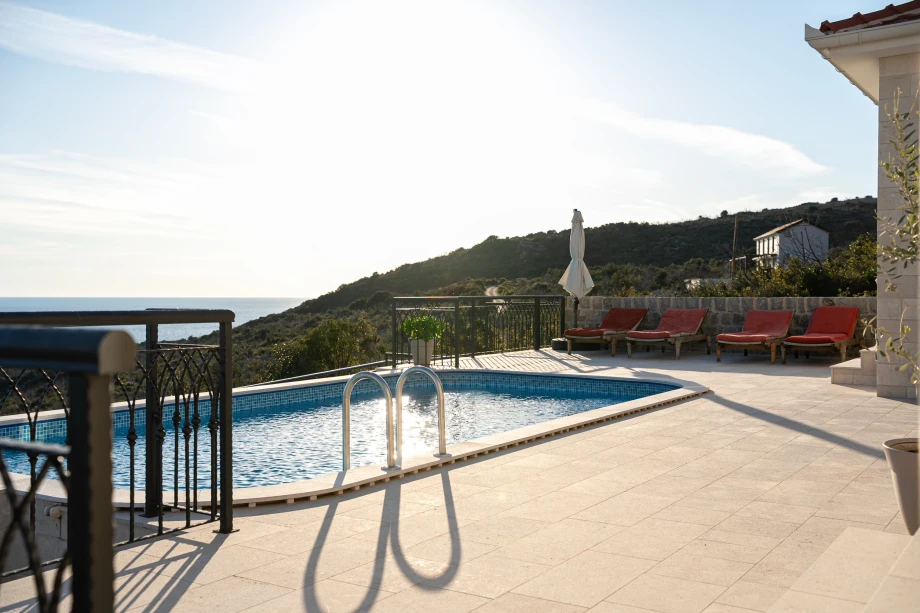 Relaxing Sunbeds by the Pool – Perfect Spot for Outdoor Leisure and Sunbathing