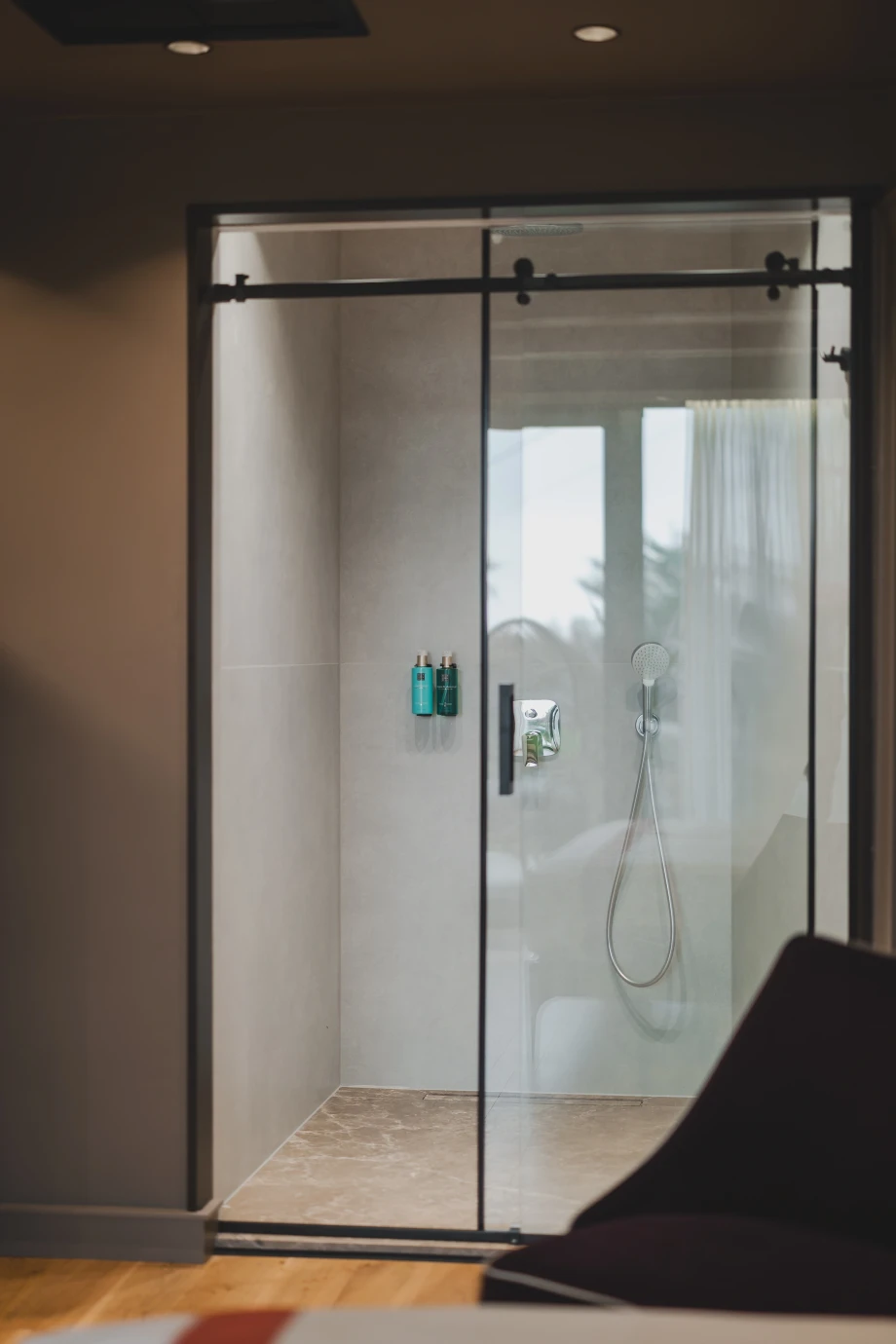 Glass-Enclosed Shower Cabin with Sleek Tile Finish