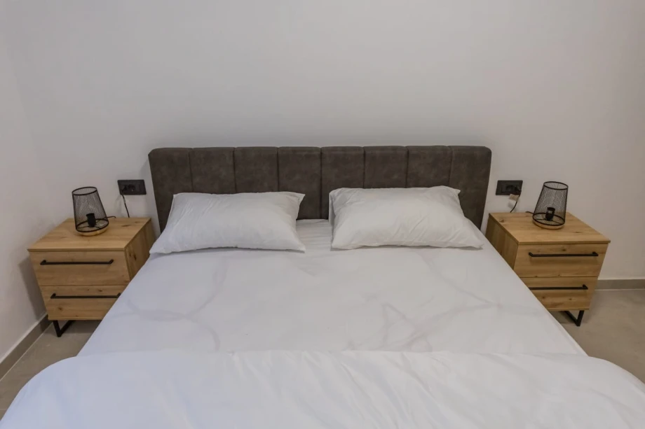 Cozy bedroom with comfortable double bed in Montenegro villa