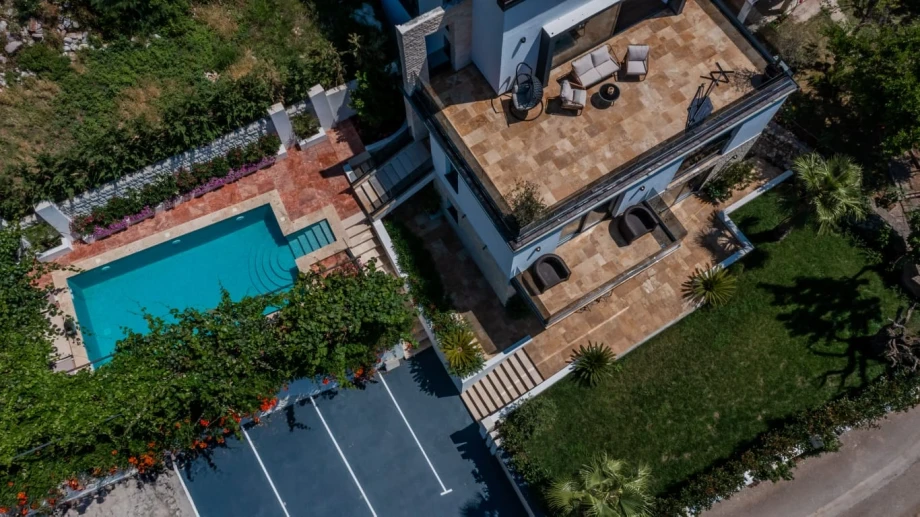 Bright and airy living room in a beautiful villa with lush terrace views