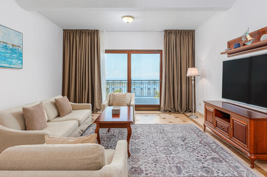 Coastal Living Room with Balcony and Elegant Wooden Details