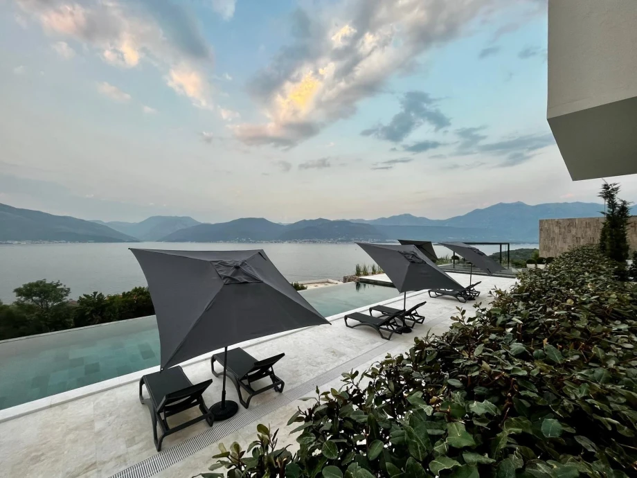 Poolside View with Sun Loungers and Adriatic Bay